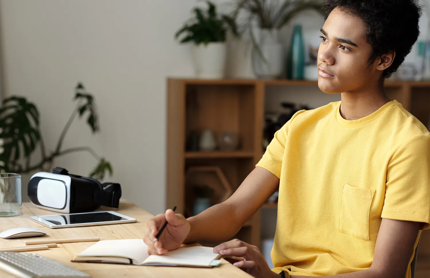 boy studying in front of computer